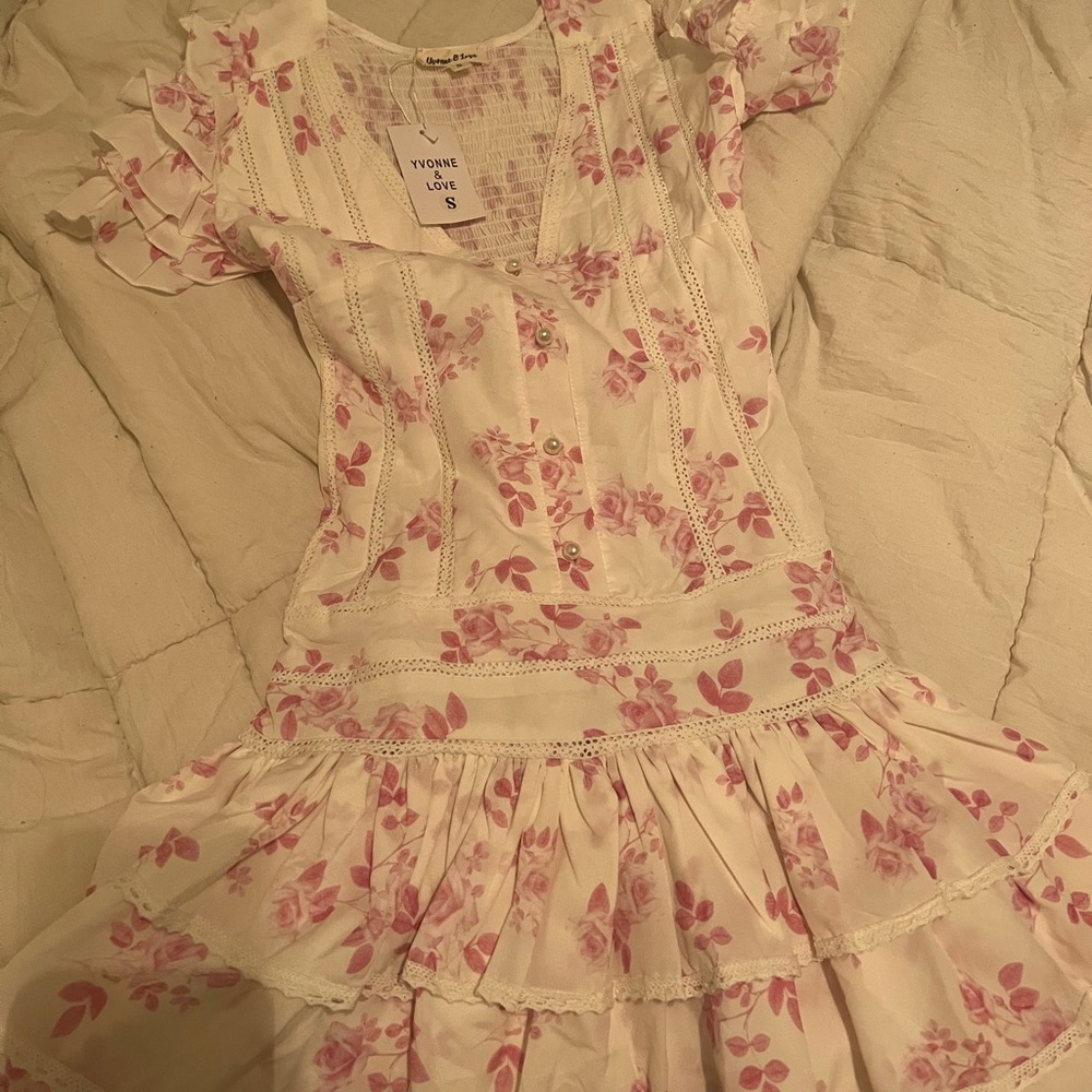 Yvonne & Love- pleated white dress with pink floral design and pearl buttons